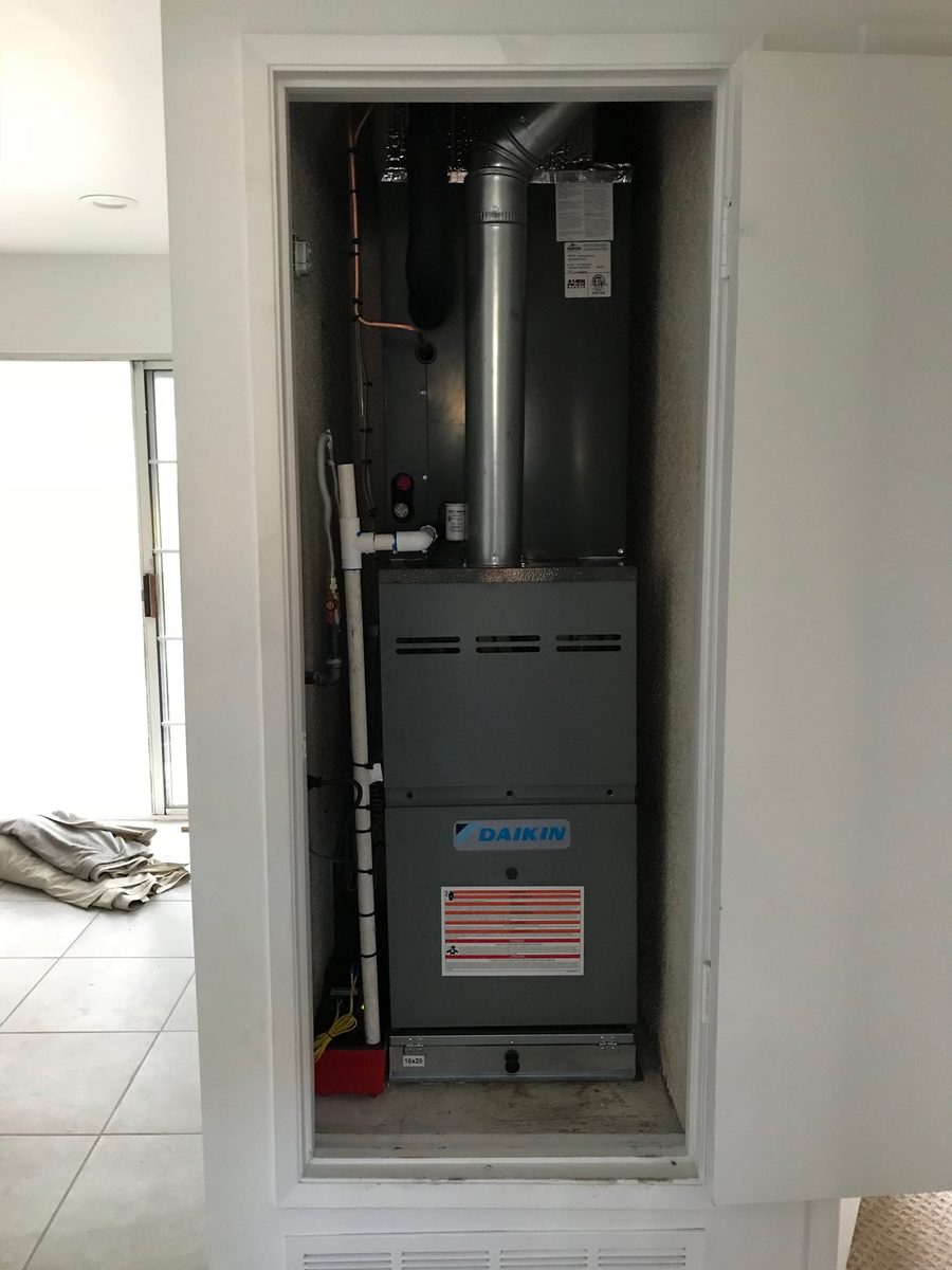 New Daikin furnace installed by Thomson in a closet